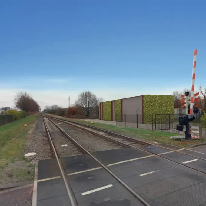 Artist impression van een onderstation naast het spoor